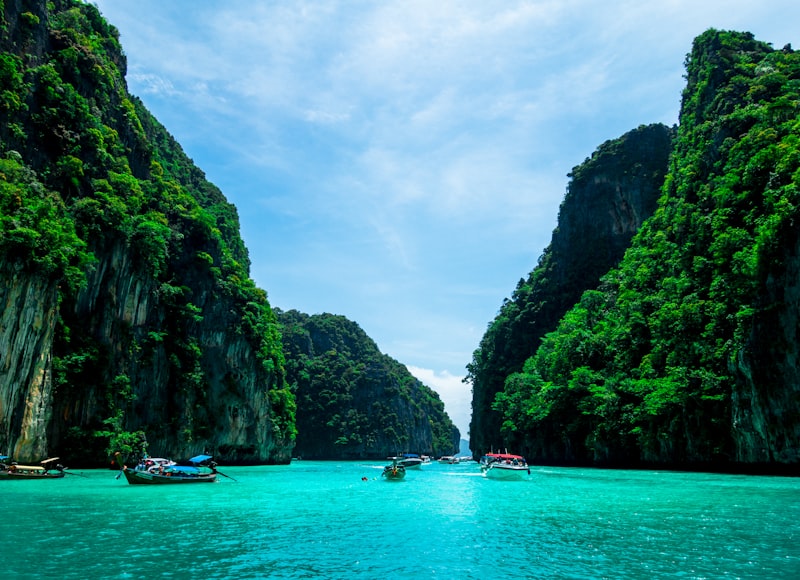 Limestone cliffs rising from turquoise waters in Phuket